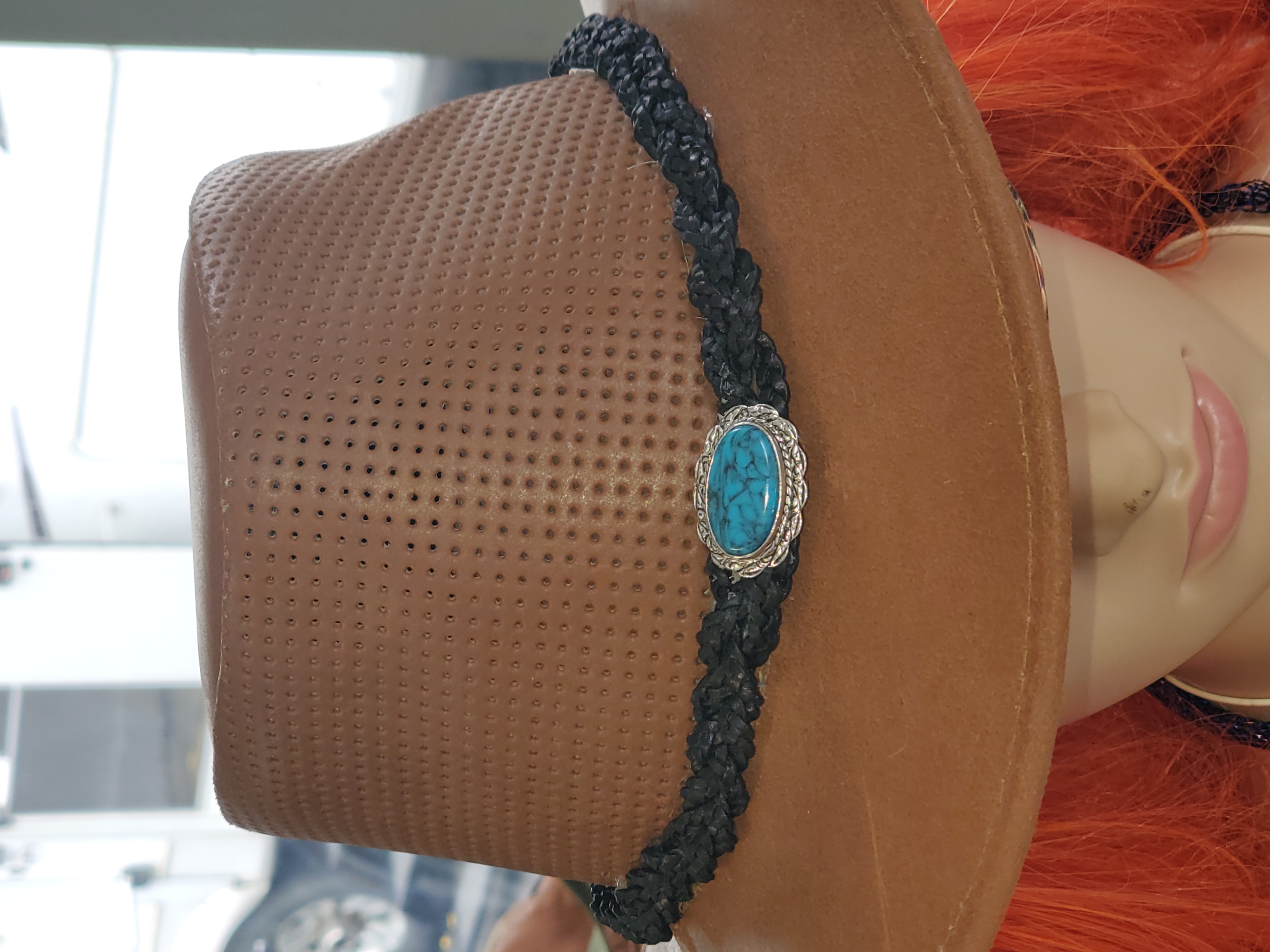 Braided hat band with repurposed brooch